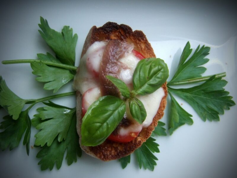 Anchovy and tomato crostini