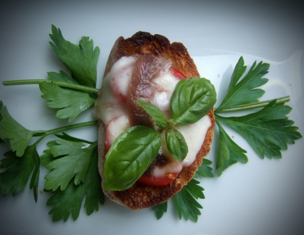 Anchovy and tomato crostini