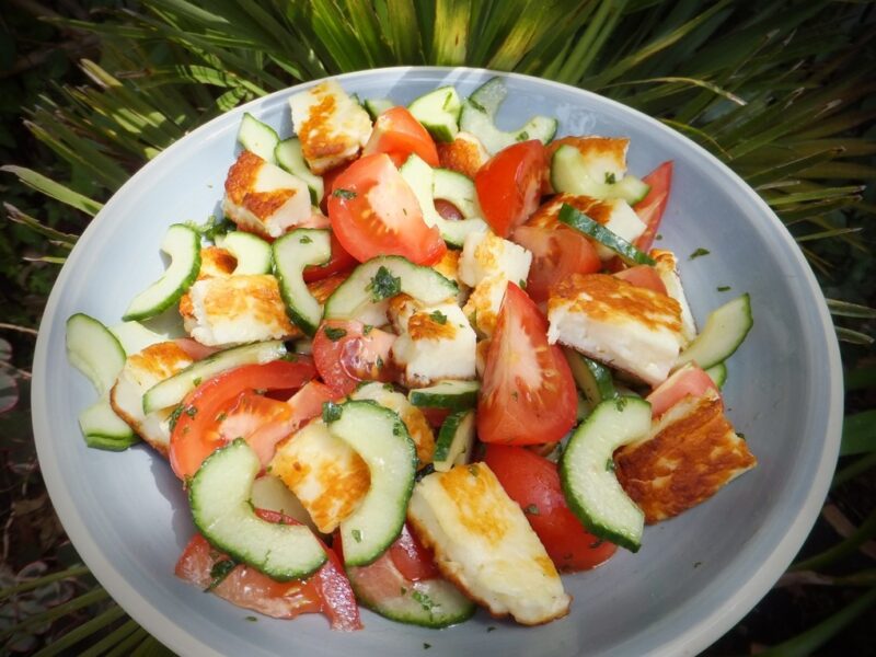 Tomato, cucumber and halloumi salad