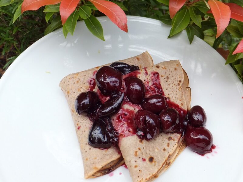 Pancakes with cherry sauce