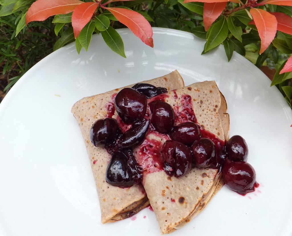 Pancakes with cherry sauce