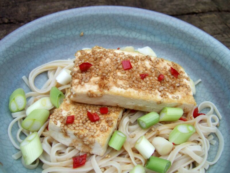 Sesame-crusted tofu with noodles