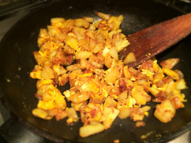 Indian style fried potatoes with eggs