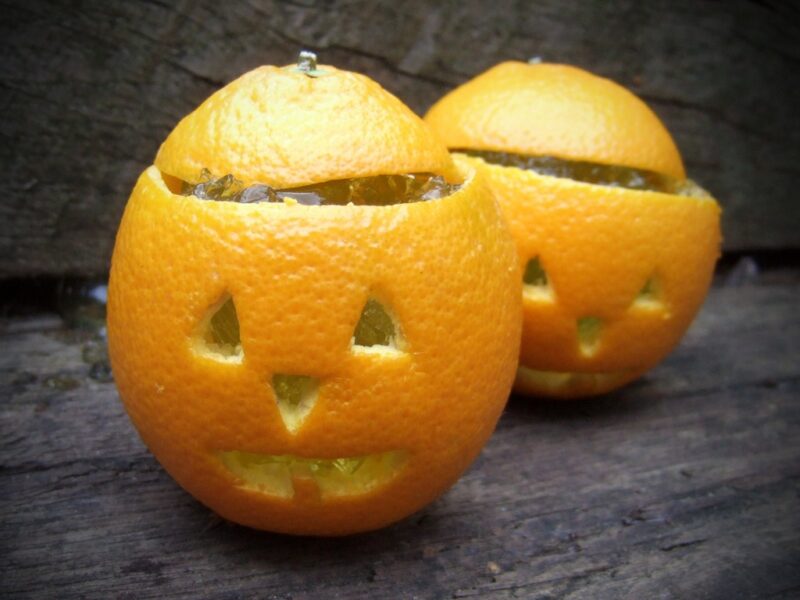 Jack O' lanterns made from orange and filled with jelly