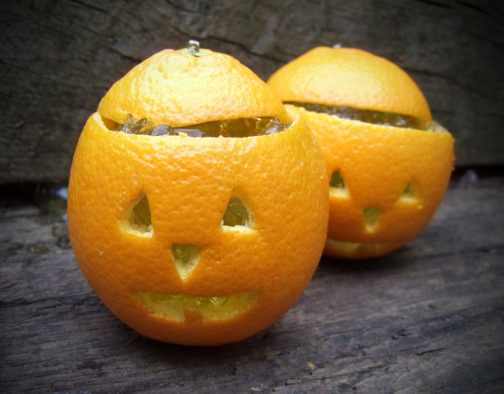 Jack O' lanterns made from orange and filled with jelly