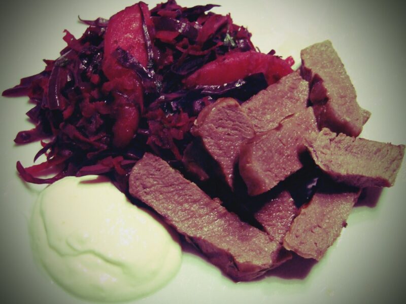 Steak with braised red cabbage, beet and pear