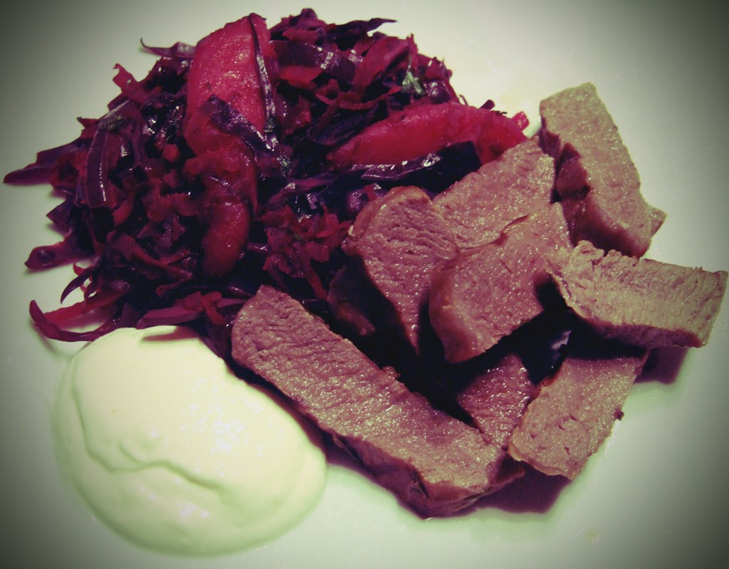 Steak with braised red cabbage, beet and pear