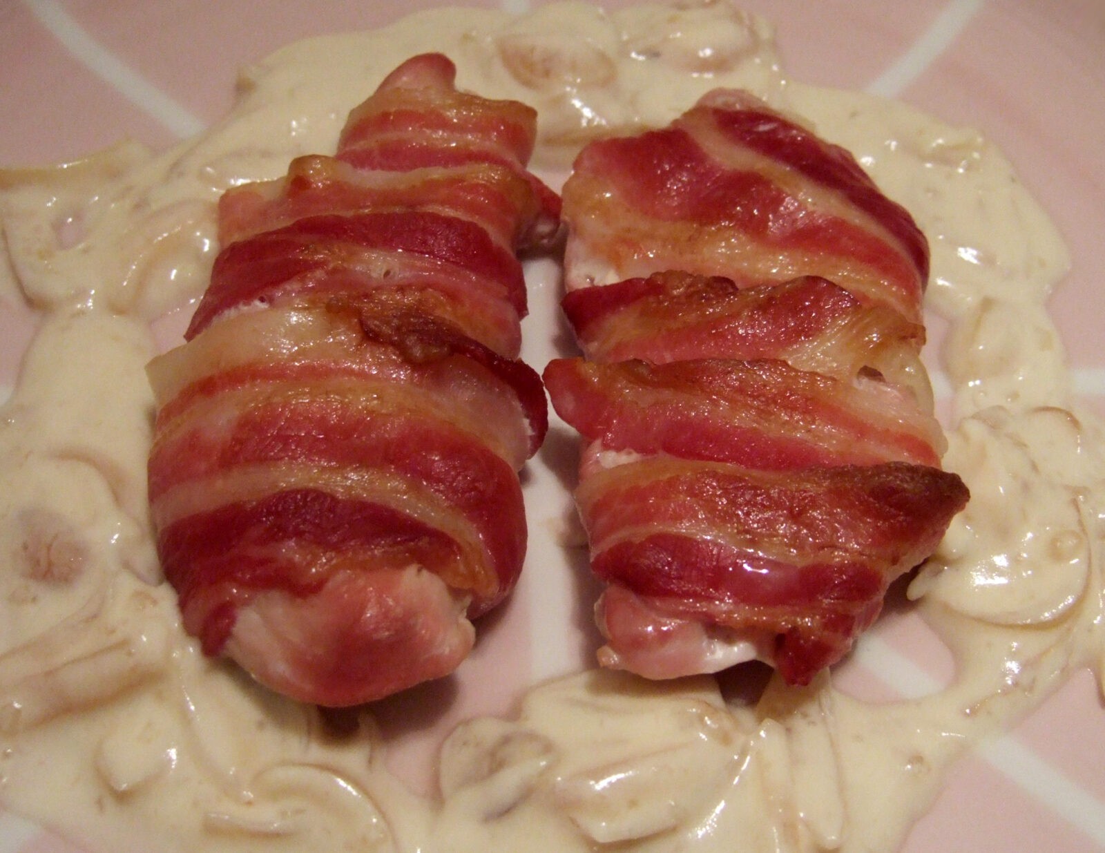 Bacon wrapped pheasant breast in cider sauce