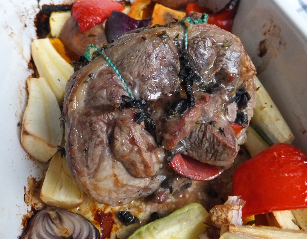 Lamb shoulder roast with red pepper and olive stuffing