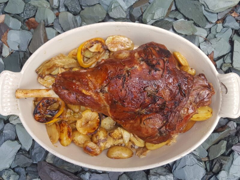 Zesty roast lamb with artichokes and new potatoes