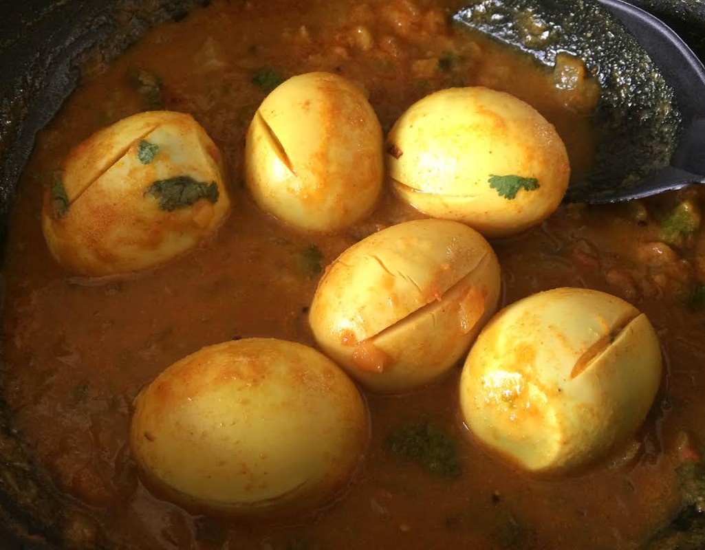 Boiled eggs in coconut milk sauce