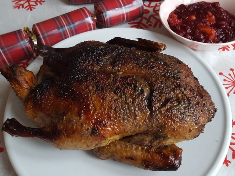 Pomegranate and orange glazed roasted duck