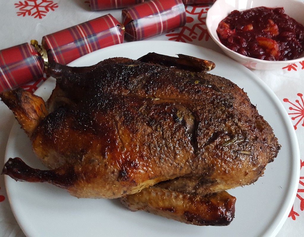 Pomegranate and orange glazed roasted duck