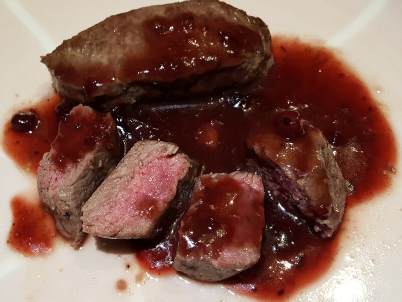 Pan-fried venison with cranberry sauce