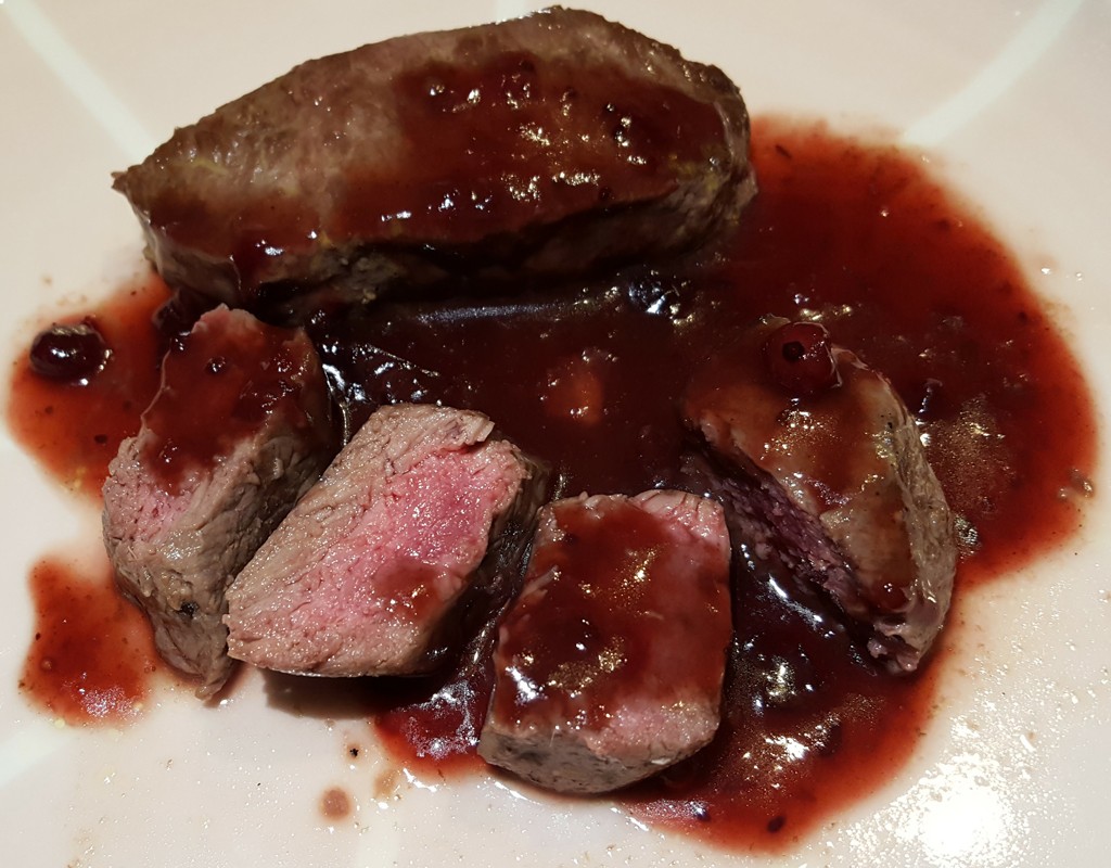 Pan-fried venison with cranberry sauce