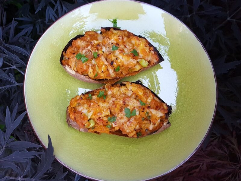 Baked sweet potatoes with spiced chicken