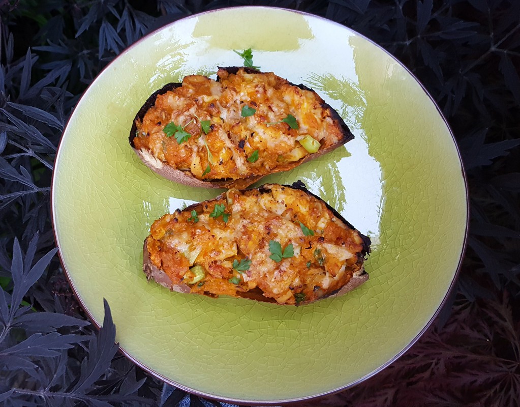 Baked sweet potatoes with spiced chicken