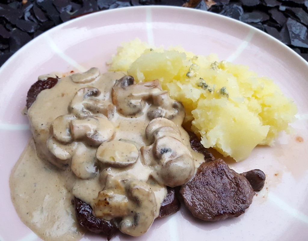 Venison steak with mushroom and Stilton sauce