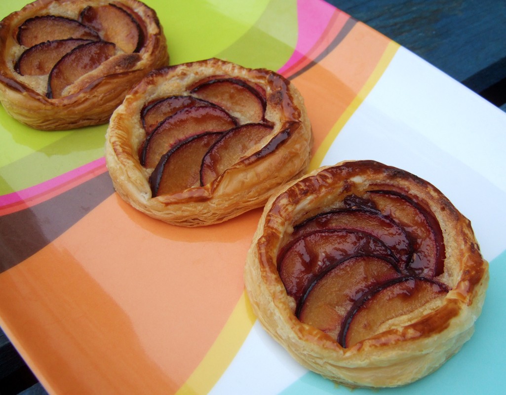 Puff-pastry plum and frangipane tarts