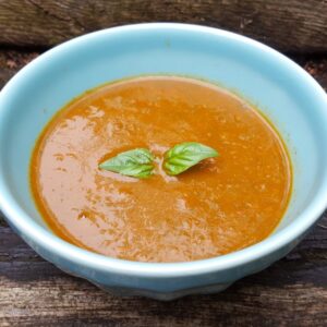 Red pepper and tomato soup with spinach