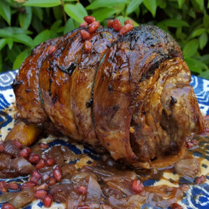 Rolled lamb roast stuffed with pomegranate and mint