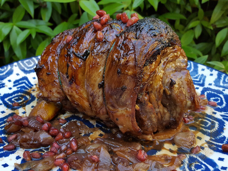 Rolled lamb roast stuffed with pomegranate and mint