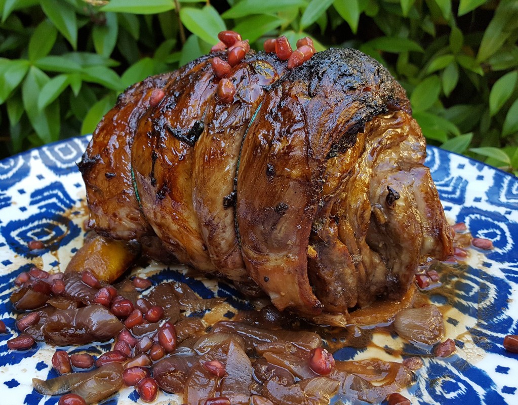 Rolled lamb roast stuffed with pomegranate and mint