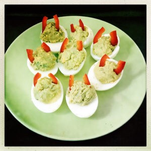 Devilish avocado devilled eggs