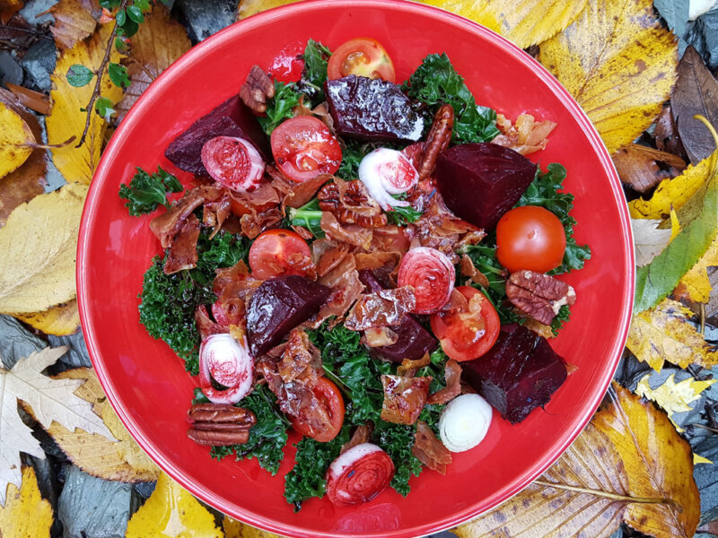 Kale with beetroot and parma ham