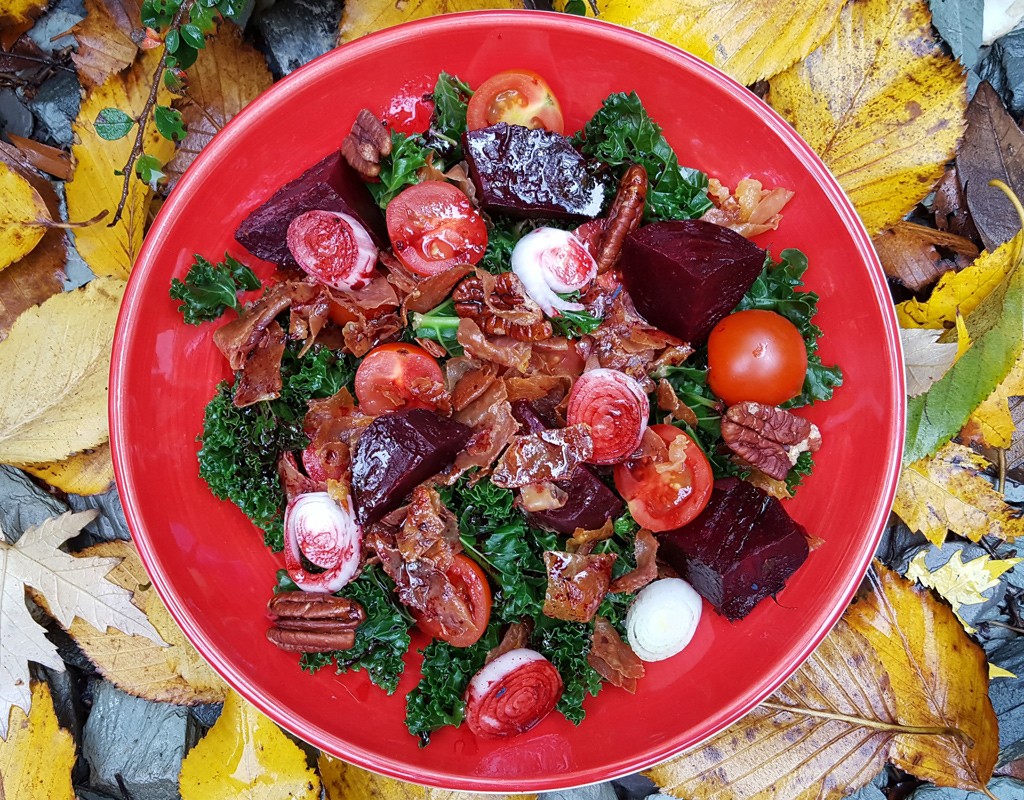 Kale with beetroot and parma ham