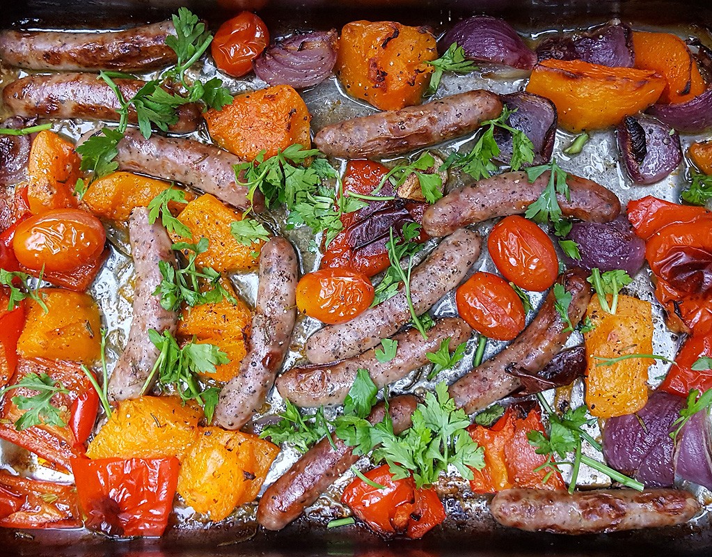 Chipolatas and squash tray bake