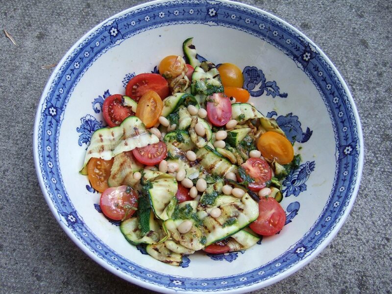 Grilled courgette, tomato and bean salad