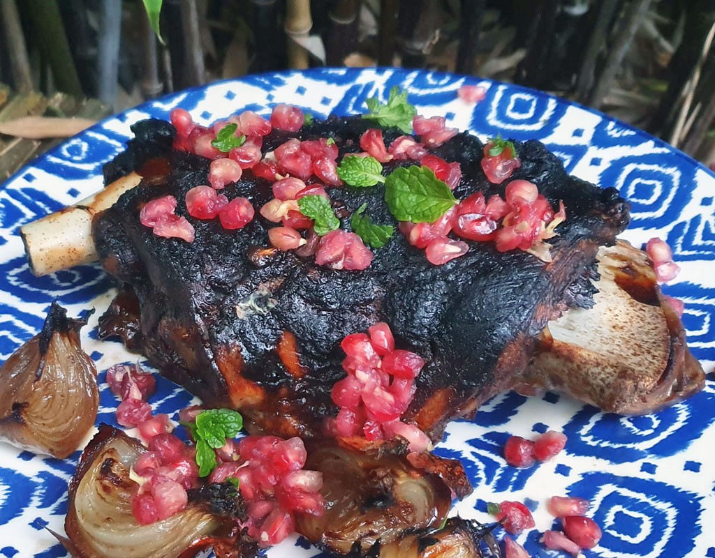 Slow-cooked lamb with pomegranate glaze