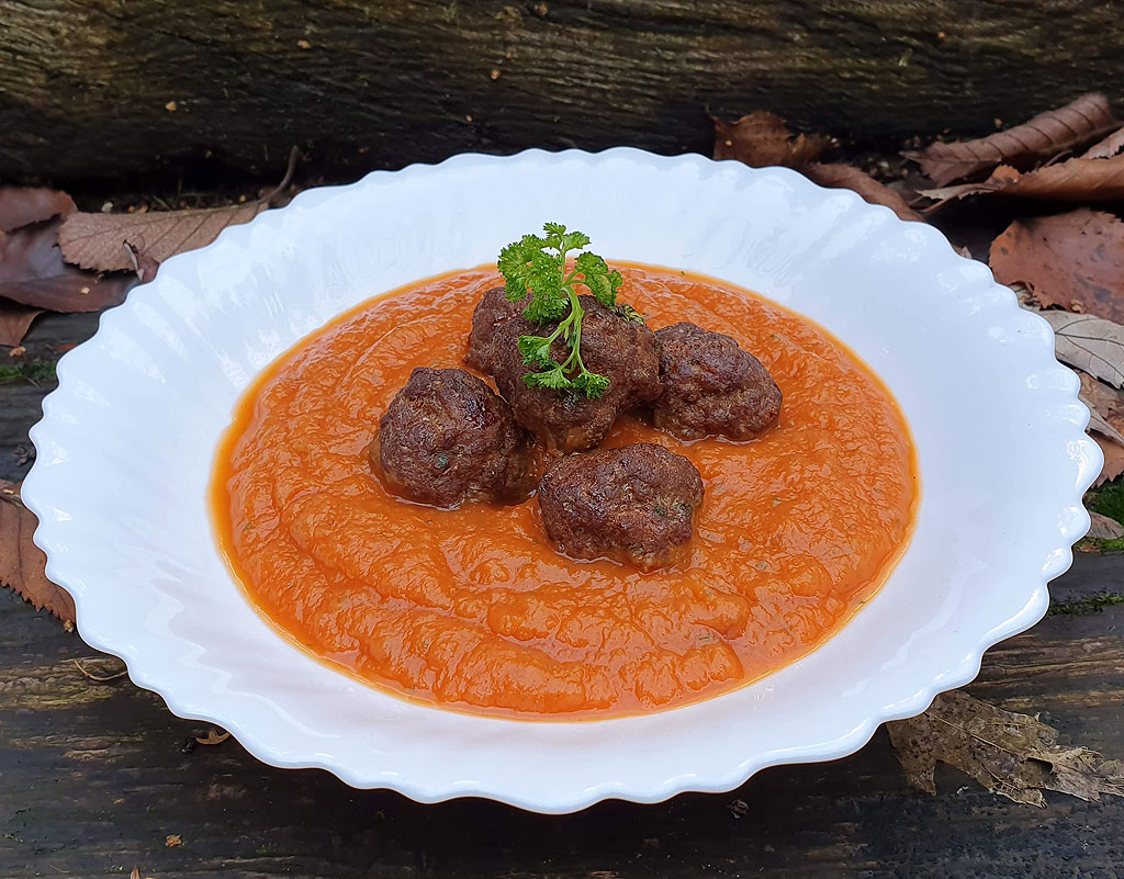 Meatballs in butternut squash and tomato sauce