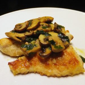 Pan-fried turkey breast with mushroom sauce