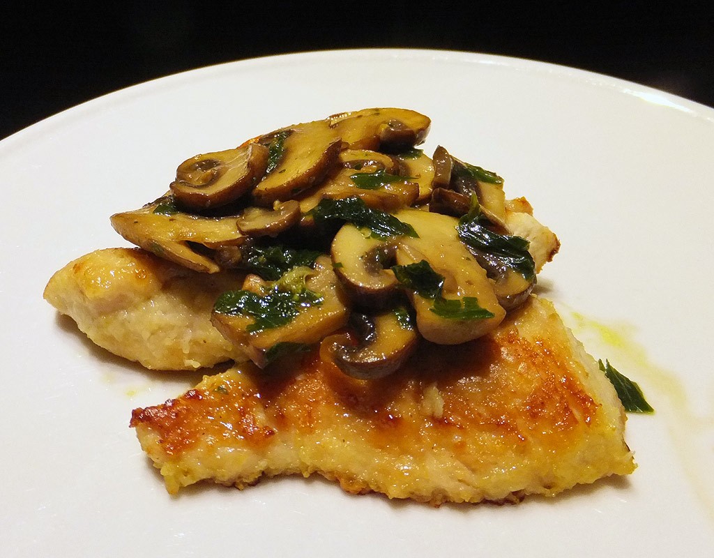 Pan-fried turkey breast with mushroom sauce