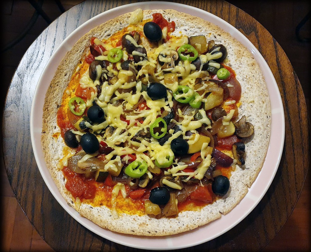 Tortilla pizza with caramelised onion, mushroom & courgette