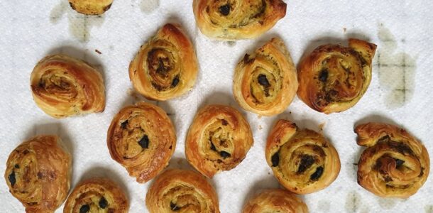 Vegan pesto and olive puff whirls