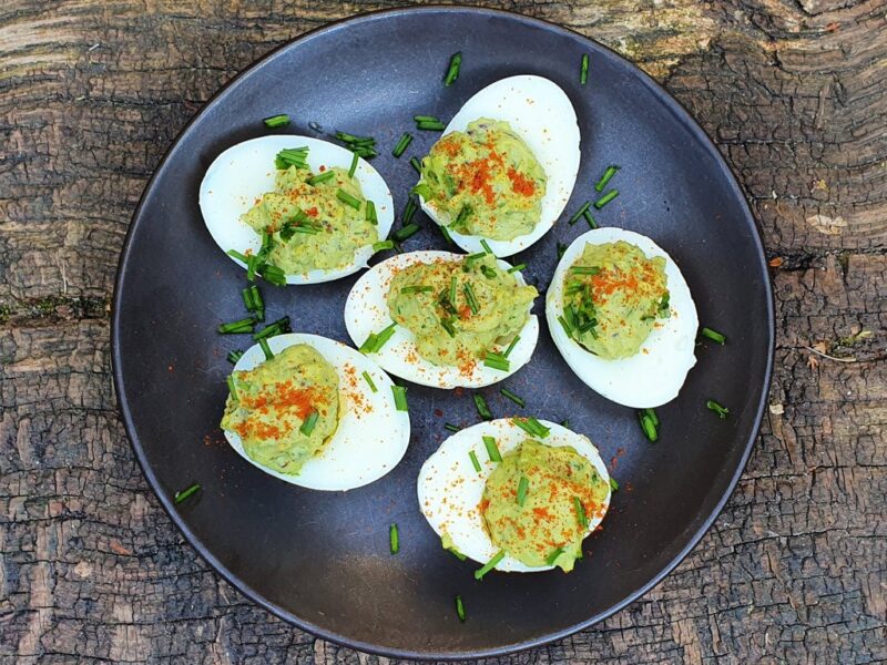 Devilled eggs with avocado cream