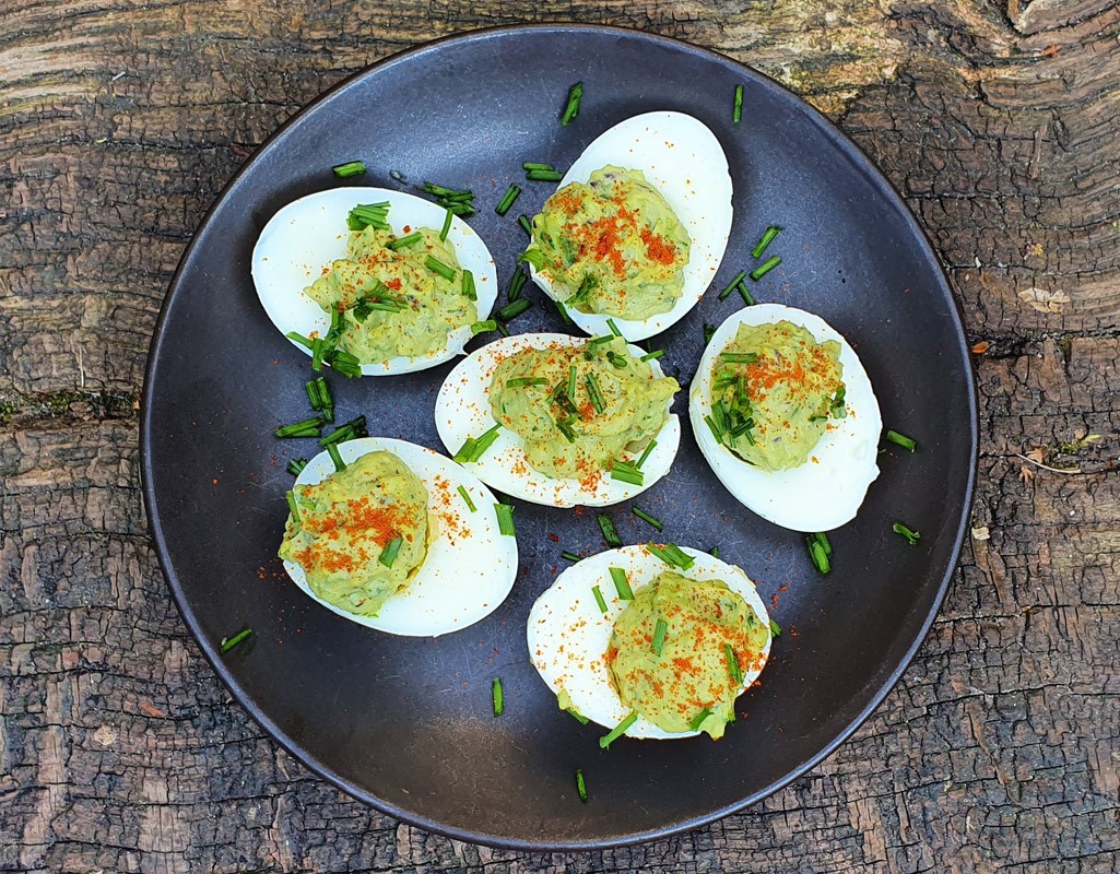 Devilled eggs with avocado cream