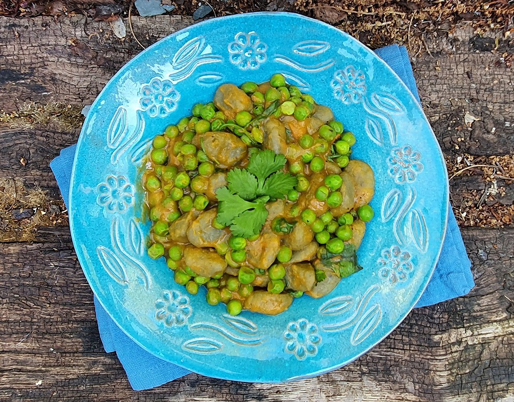 Gnocchi with sweet potato sauce and peas