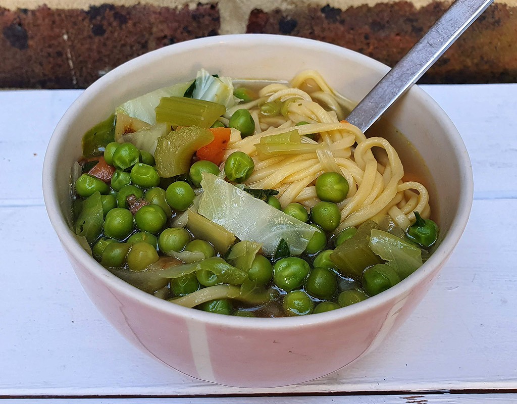 Spring vegetable soup with noodles