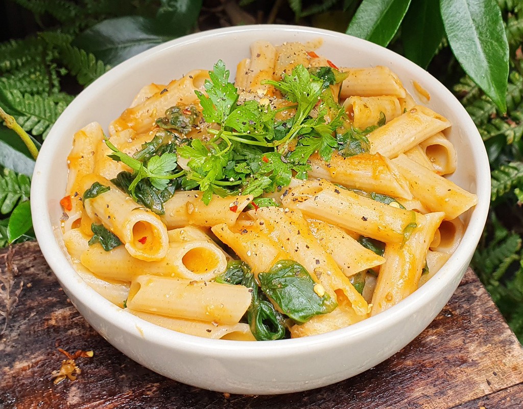 Pasta with sweet potato sauce and spinach