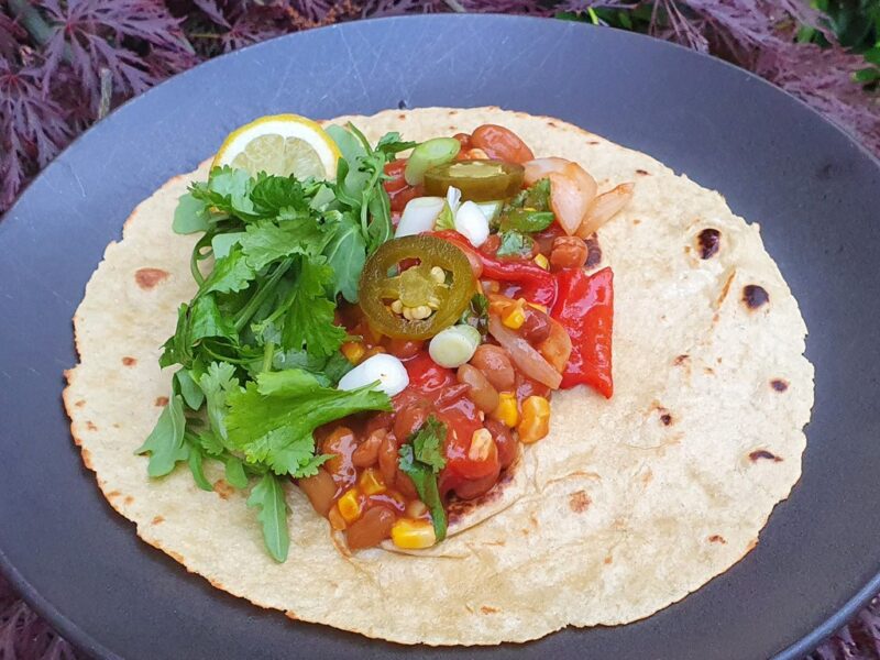 Tortilla with spicy beans and grilled vegetables