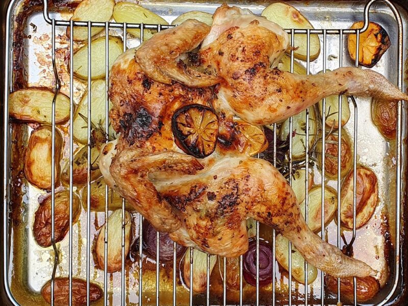 Butterflied roast chicken with potatoes