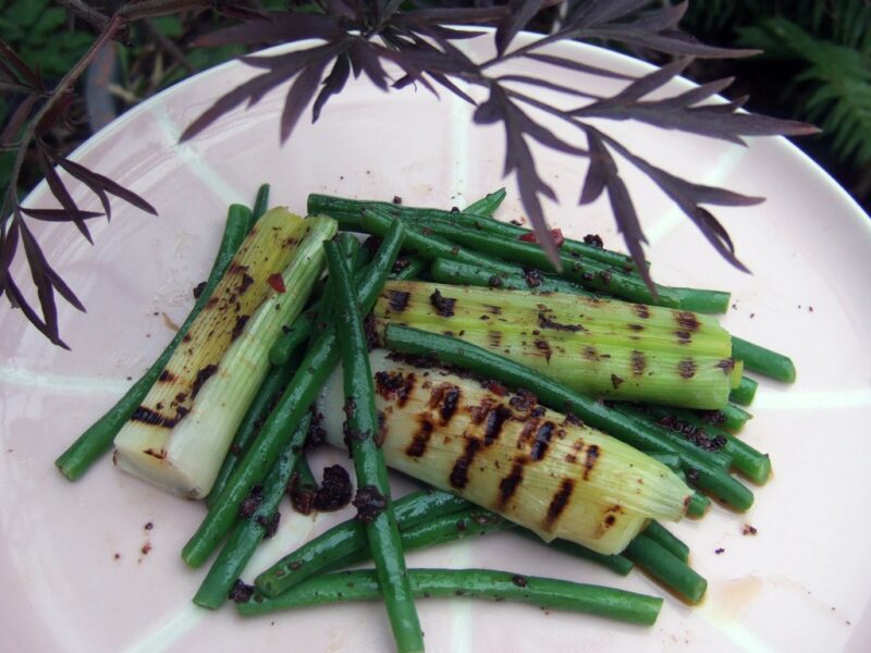 Leek and green beans with black olive dressing