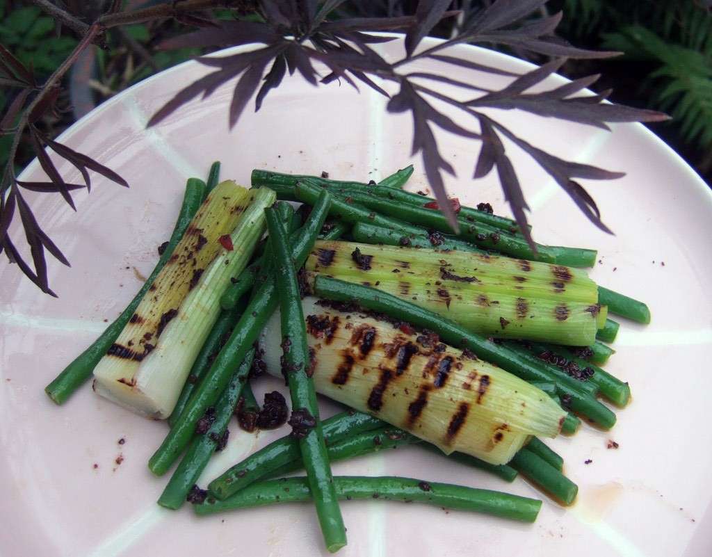 Leek and green beans with black olive dressing