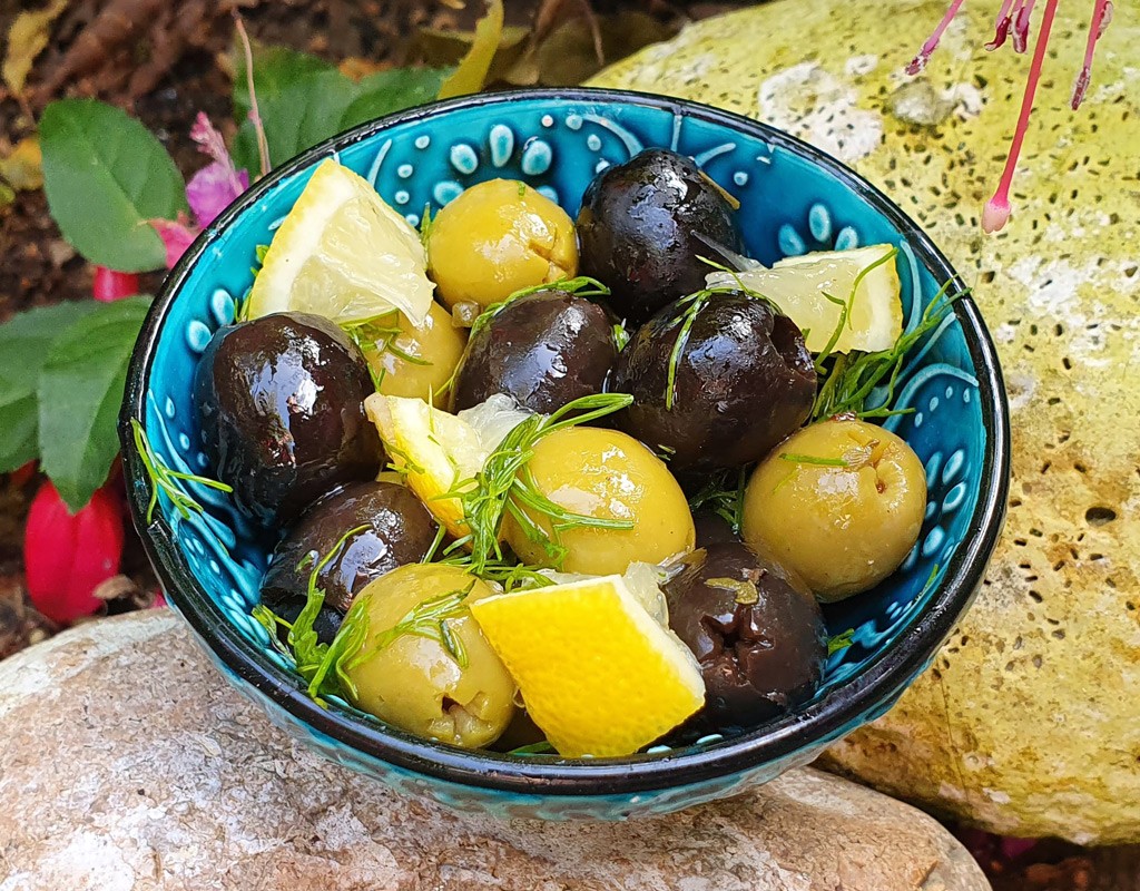 Mixed olives with lemon and dill