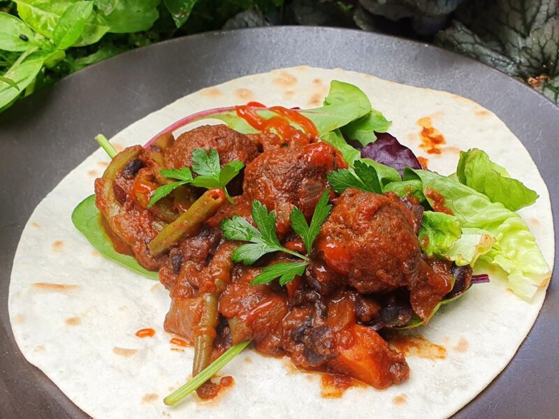 Vegan meatball and black bean burritos