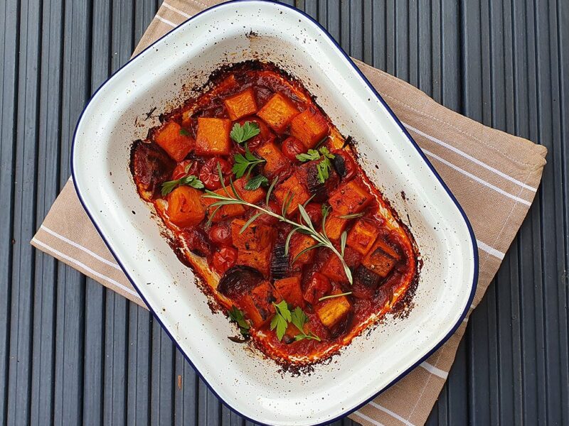 Baked butternut squash with tomatoes